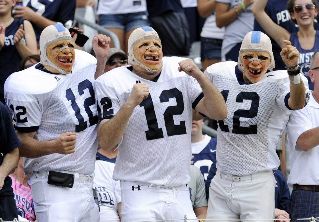 Penn State fans cheer during the first quarter of an NCAA college football game against Syracuse Saturday, Aug. 31, 2013, in East Rutherford, N.J. (AP Photo/Bill Kostroun)